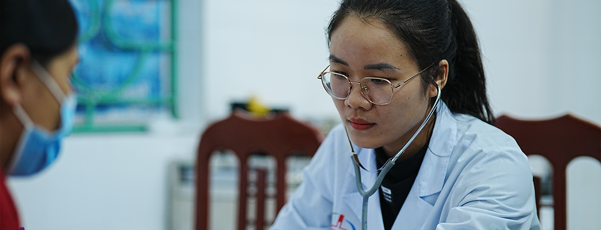 clinician with stethoscope
